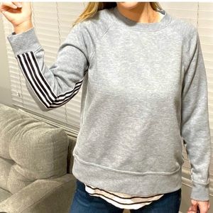 Avia gray sweatshirt with black and white stripes. Size M(8-10)